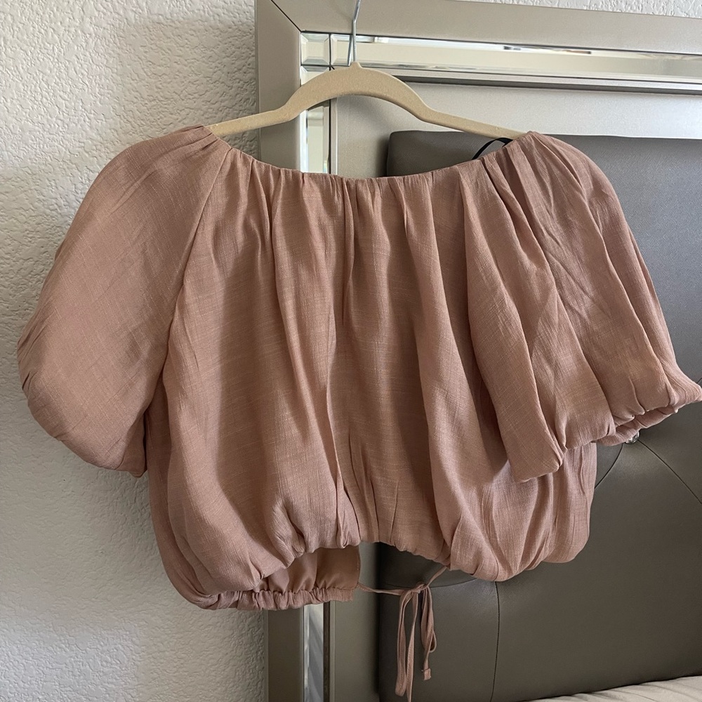 Beige top with open back